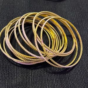 Claire’s gold/pale pink bangles